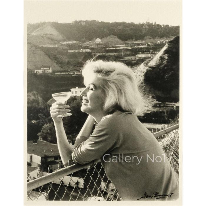 FIND PHOTOGRAPH OF MARILYN MONROE DRINKING CHAMPAGNE BY GEORGE BARRIS